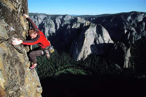 One Man Climbing A Steep Wall Photograph By Corey Rich