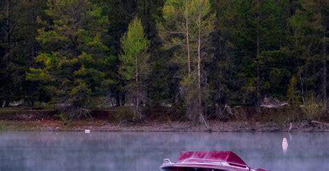 Boat On Calm Body Of Water Near Trees · Free Stock Photo