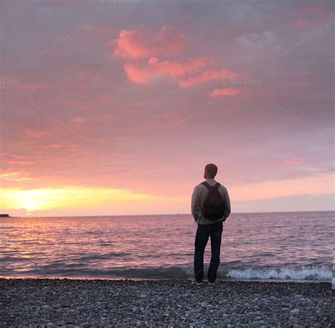 Man Looking At The Sunset ~ People Photos On Creative Market