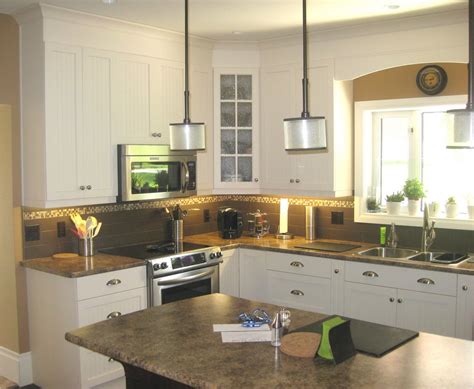 Whether you are building or remodeling your home, cabinets have become a major focus and expense in the. FIVE STAR PHOTO GALLERY: Light Cabinets with Accent Island
