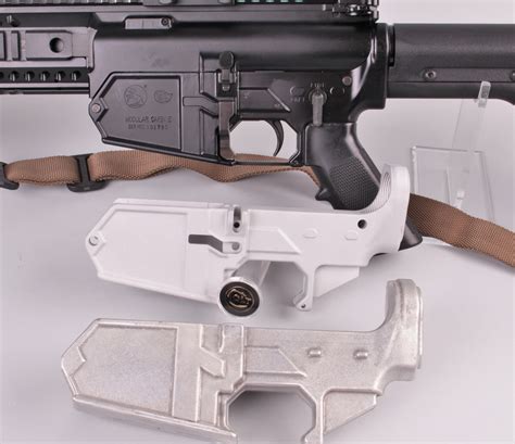 Three Colt Le901 Lower Receivers In Different Levels Of Completion