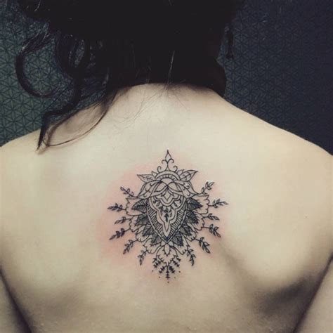 Ornamental Style Tattoo On The Upper Back Original