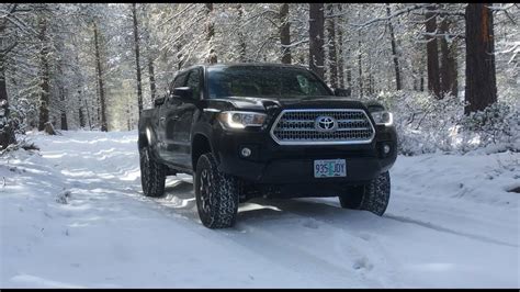 Toyota Tacoma Driving Through The Snowy Woods Youtube