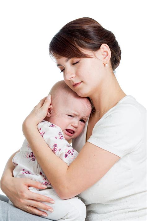 Mother Trying To Comfort Her Crying Baby Isolated Stock Image Image