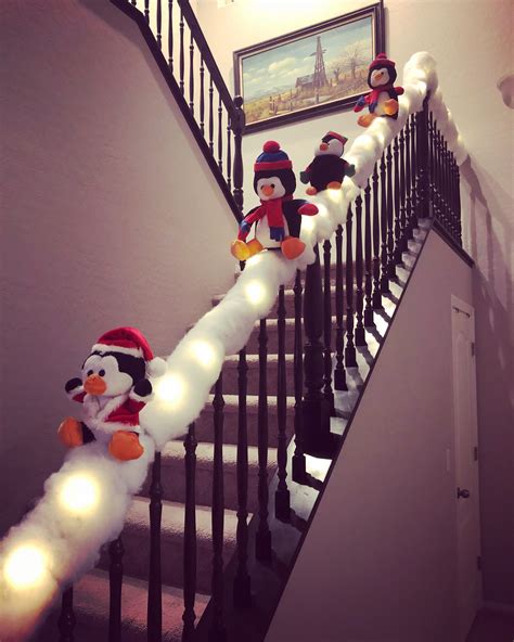 Sliding Penguins On Banister In 2022 Fun Christmas Decorations