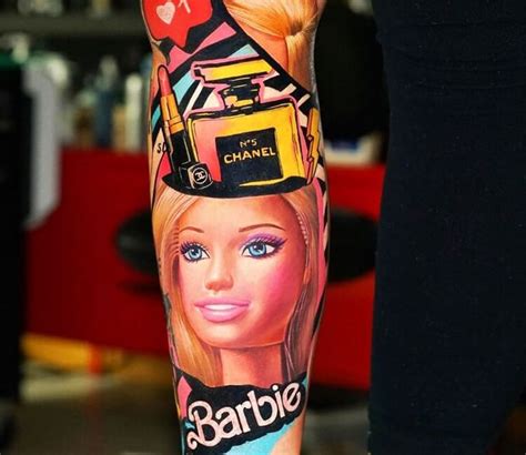 A Person With A Barbie Doll Tattoo On Their Leg