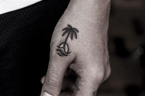 100 Inspirational Palm Tree Tattoos And What They Symbolize