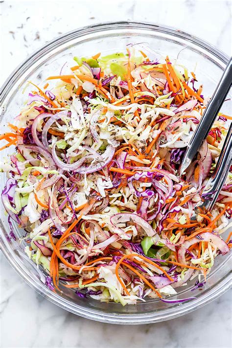 To make a lighter coleslaw dressing that still has a rich mouthfeel, make an emulsion with the oil and vinegar. Sweet Vinegar Coleslaw (No Mayo) | foodiecrush .com