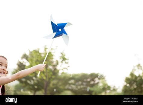 Girl With A Pinwheel Hi Res Stock Photography And Images Alamy