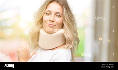 Young Injured Woman Wearing Neck Brace Proud Excited And Arrogant