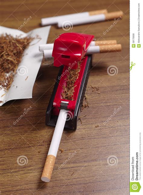 Rolling Machine And Cigarettes Stock Photo Image Of Lifestyle Table