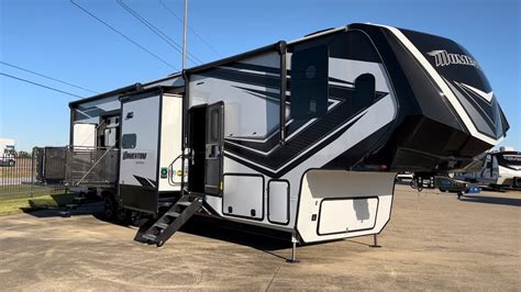Side Patio Rear Patio Momentum 399th 5th Wheel Toy Hauler By Grand