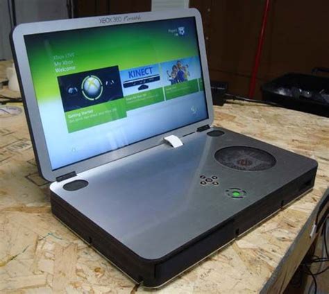 An Open Laptop Computer Sitting On Top Of A Table