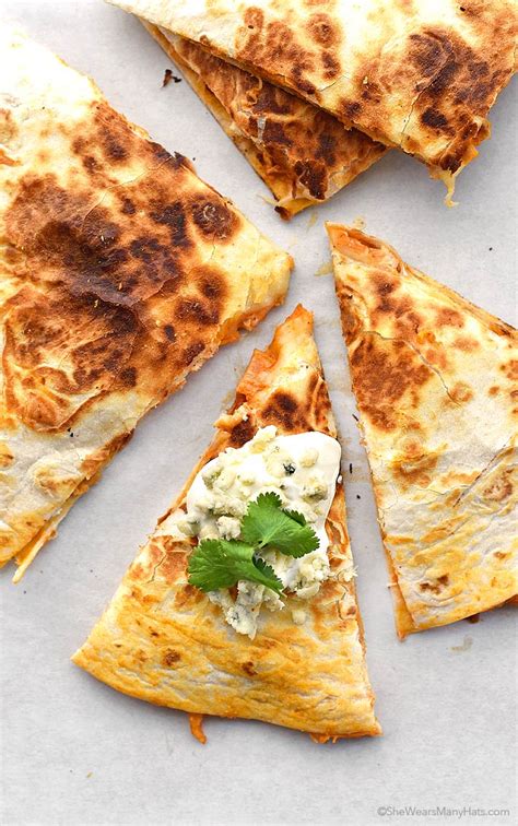 When the tortilla is golden on the first side, carefully flip the quesadilla to the other side, adding another 1/2 tablespoon butter to the skillet at the. Buffalo Chicken Quesadillas Recipe | She Wears Many Hats