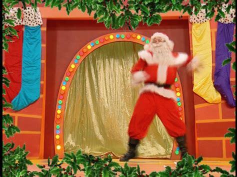 Santa Clause Doing A Dance Yule Be Wiggling The Wiggles Christmas