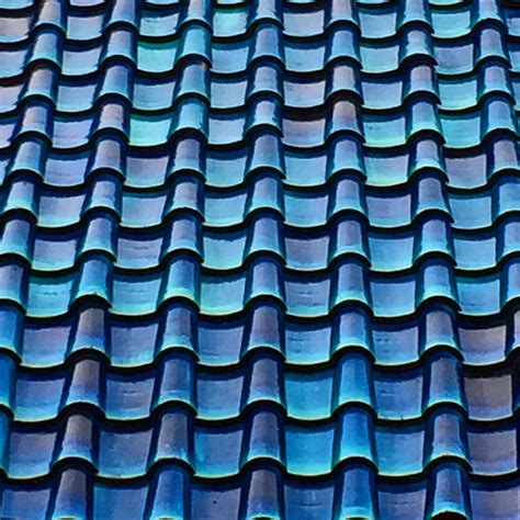 Blue Tiled Roof Roof Tiles Blue Roof Rooftop Design