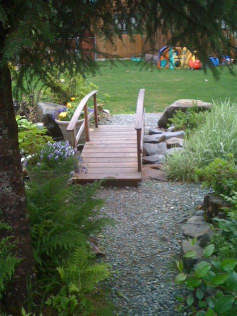 A Cedar Bridge Across The Dry Creek Bed For The Grandchildren Garden