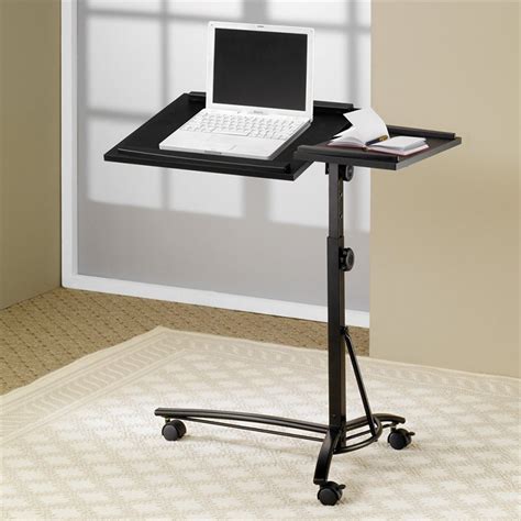 The laptop stand is made out of a single piece of aluminum for added stability and strength. Coaster Desks Adjustable Mobile Laptop Stand in Black ...