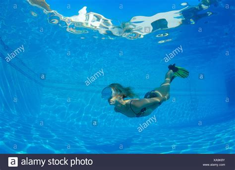 Young Woman Swimming Underwater In High Resolution Stock Photography