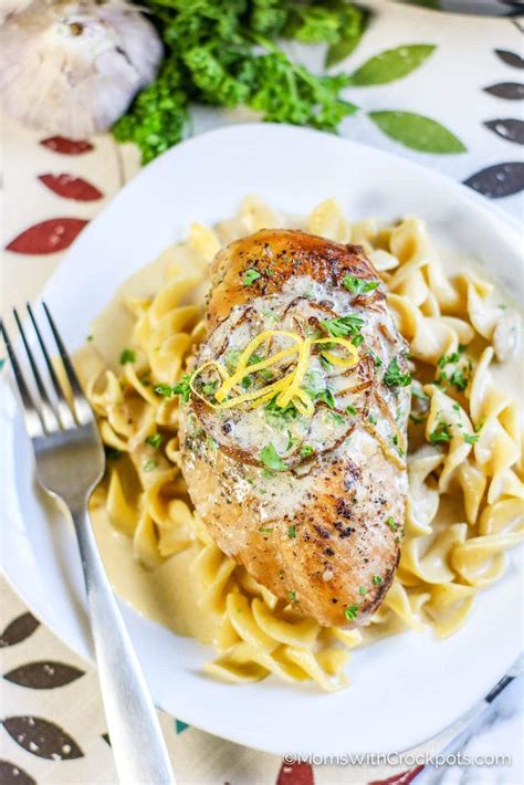This crockpot lemon chicken is light and fresh yet rich and creamy. Crock Pot Creamy Lemon Chicken Recipe - Moms with Crockpots