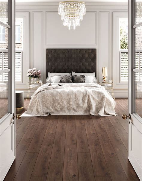Laminate floors a durable and unique surface is the perfect rendition of a real timber floor. Manor - Prestige Oak Dark Laminate Flooring | Direct Wood ...