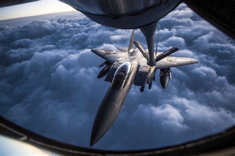 An F 15 Strike Eagle Receives An Aerial Refueling From A Kc 135