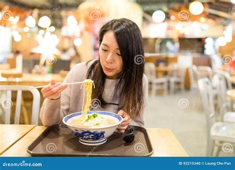 Young Woman Eating Ramen In Restaurant Stock Photo Image Of Chinese