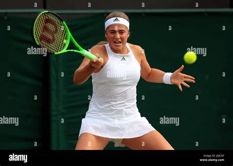 Jelena Ostapenko In Action Against Camila Giorgi On Day Five Of The Wimbledon Championships At