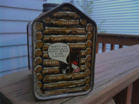 Originally, towle's log cabin syrup had strong ties to the maple industry and produced pure maple syrup in their tins. Another Towles's Log cabin Syrup Tin | Collectors Weekly