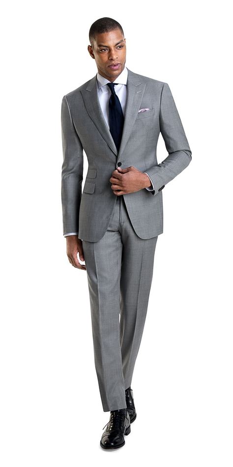 see how we turned down the volume on the plaid suit with this gray on gray version that makes