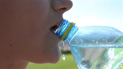 Close Up Of Woman Drinking Water From Stock Footage Sbv 310233635