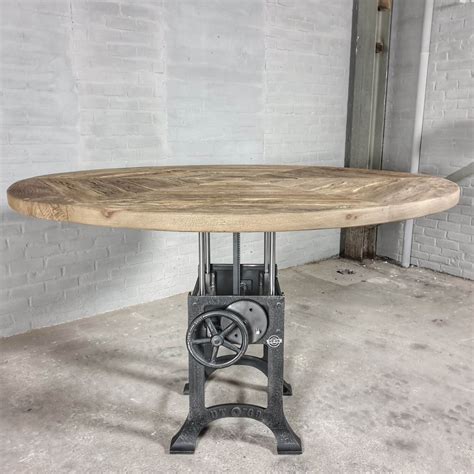 I'm really loving the industrial one of the items in my booth was this fabulous round industrial coffee table. Round industrial table with a height adjustable crank base ...