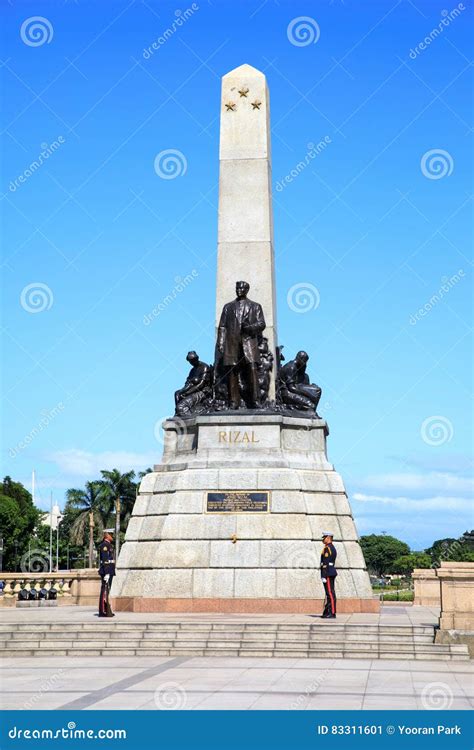 A Monument Of Philippine Hero Dr Jose Rizal Flanked By Philippine Flags