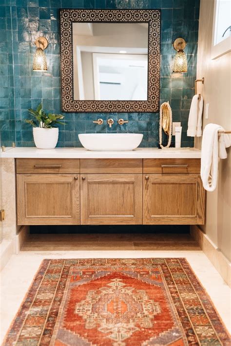 modern moroccan inspired bathroom bold zellige blue tile combined with vintage mirror a