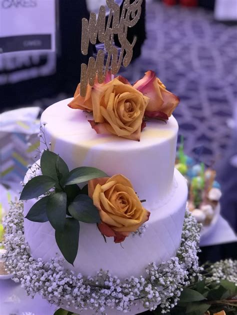 They're not too big, not too small, but just right. 2 Tier Fondant Wedding Cake with Real Flowers | Wedding ...