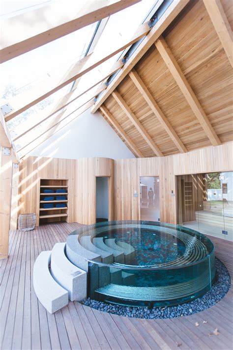 Maxwell mackenzie inspiration for an expansive mediterranean round swimming pool in miami with a pool house and natural stone paving. Swimming Pool Glass