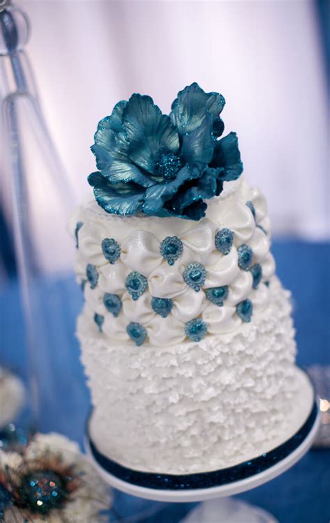 White And Turquoise Ruffled And Billowed Wedding Cake Wedding Cakes