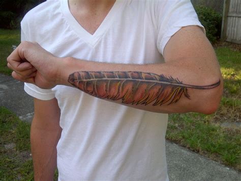 Feather Tattoos Meaning Ideas And Tattoo Designs Tattoo Me Now