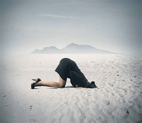 Woman Buried In Sand Stock Photos Pictures And Royalty Free