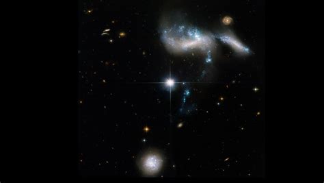 Hubble Space Telescope Spots Streams Of Star Formation Flowing Between