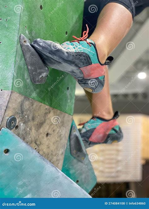 Close Up Detailed Shot Of Female Climber S Foot Stepping On A Small