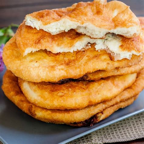 Fried Dough Filled With Feta Cheese Aka Langosi Cu Branza Jo Cooks