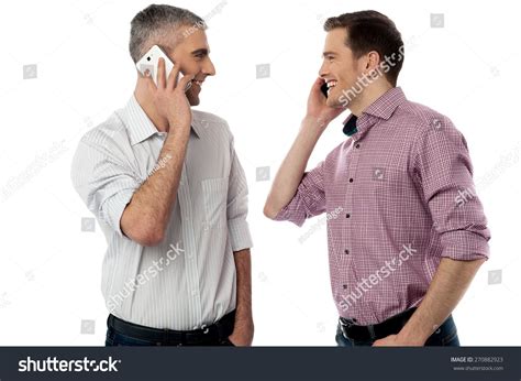 Two Young Friends Happily Talking On Mobile Phone Ad Sponsored