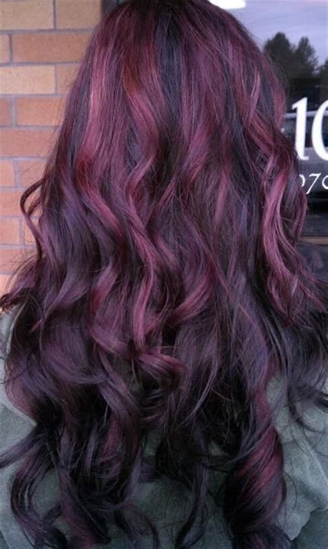 Beautiful young gypsy with long blond hair in which a rose is inserted. Purple Highlights for Summer - Pretty Designs