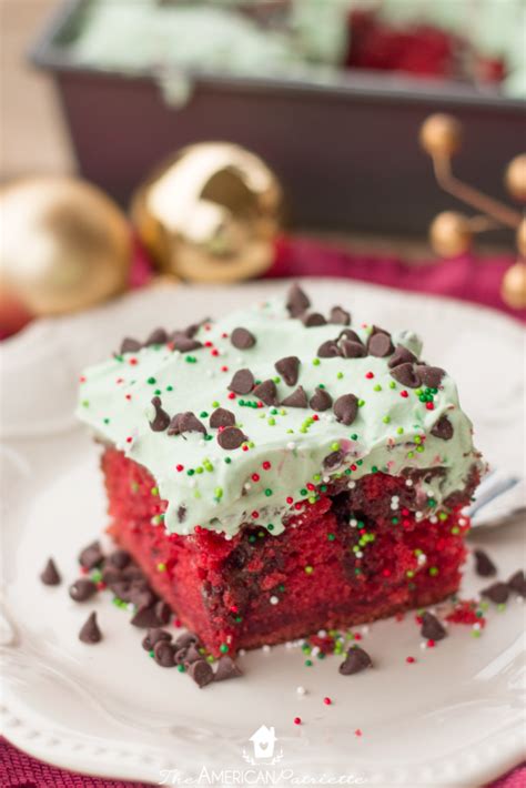 Rich chocolate peppermint cake moistened with sweetened condensed milk, smothered in whipped cream, and topped with candy cane bits. Christmas Red Velvet Chocolate Poke Cake - The American ...