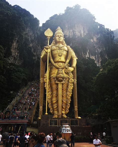 | guarded by a monumental statue of hindu deity lord murugan, the batu caves are a malaysian national treasure and an unmissable day trip from kuala lumpur. Batu Caves of Kuala Lumpur, Malaysia. | Buddha statue ...