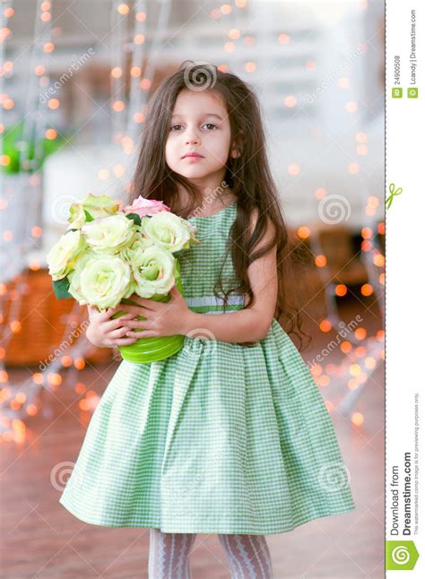 Pretty Little Girl In Beautiful Green Dress With R Stock