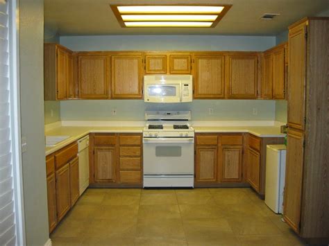 Alkyd paint you will likely choose between latex and oil based when choosing cabinet paint. scrap-ali ever after: Black Painted Kitchen Cabinets