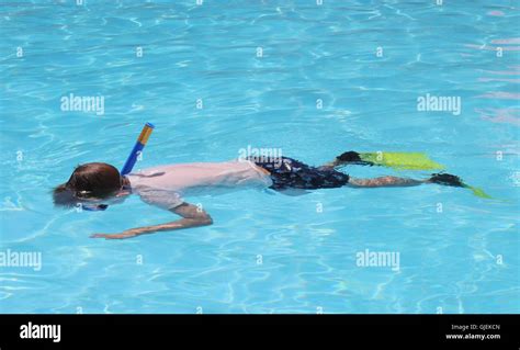A Young Boy Snorkeling Stock Photo Alamy
