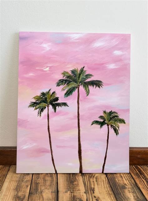 Three Palm Trees Against A Pink Sky Painted On An Acrylic Canvas With